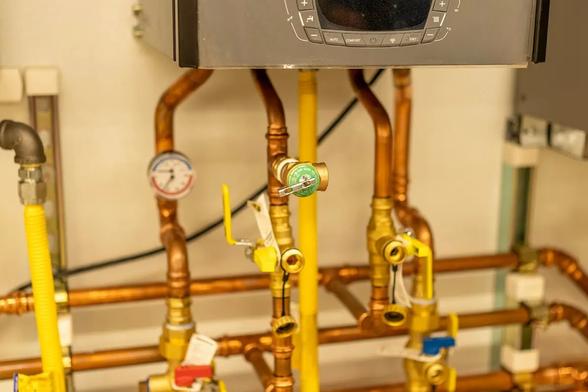 Licensed technician providing Backflow Prevention for a homeowner in Riga